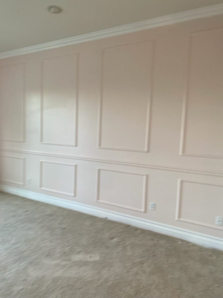 Freshly painted wall with a smooth, even finish in a soft neutral color – enhancing the room’s ambiance and modernizing the space