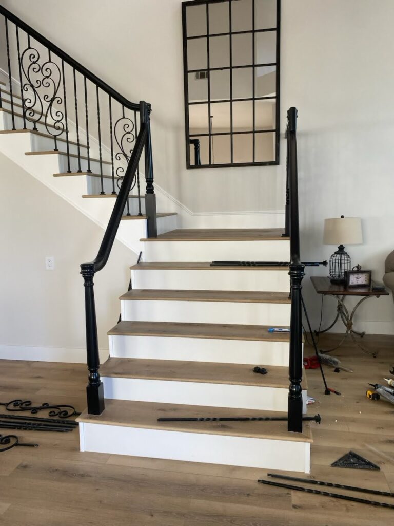 Elegant staircase with wooden treads, metal railing, and modern design – stylish and functional interior feature enhancing home aesthetics